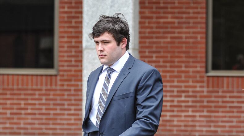 Former University of Mississippi student Austin Reed Edenfield leaves federal court Thursday, March 24, 2016, after pleading guilty to placing a noose on the school's statue of its first black student, in Oxford, Miss. Edenfield waived indictment and pleaded guilty to a misdemeanor charge before U.S. District Judge Michael Mills. The charge says Edenfield helped others threaten force to intimidate African-American students and employees at the university. Edenfield will be sentenced on July 21 and faces up to a year in prison and a $100,000 fine. The government has recommended probation. (Bruce Newman/Oxford Eagle via AP)