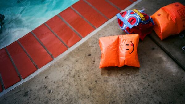 Orange swimming floaties.