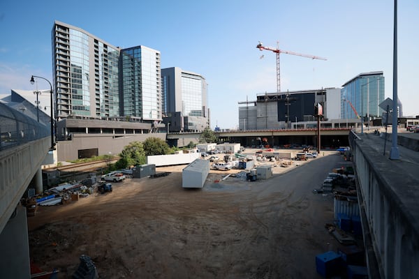 Centennial Yards aims to build a 12-story apartment tower along with retail space on a downtown Atlanta site currently beneath the surrounding city viaducts. This is the site as of June 30, 2026. (Miguel Martinez/AJC)