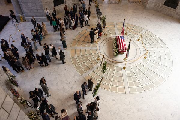 Attendees pay their respects during a funeral service for former U.S. Rep. Mia Love, Sunday, April 6, 2025, in Salt Lake City. (AP Photo/Melissa Majchrzak)