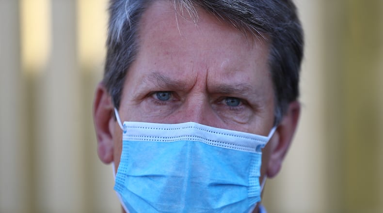 050520 Albany: Gov. Brian Kemp wears a mask and urged fellow citizens to do the same after touring the temporary medical pod that has been placed at the Phoebe North Campus of Phoebe Putney Health System on Tuesday, May 5, 2020, in Albany. The pod at Phoebe North arrived on April 15 and is scheduled to begin operations on Wednesday, May 6, housing 24 beds to treat non-critical COVID-19 patients. Curtis Compton ccompton@ajc.com