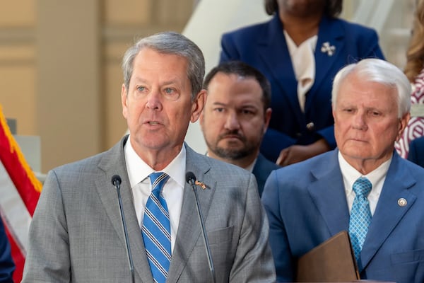 Gov. Brian Kemp speaks before signing multiple pieces of legislation inside the Georgia state Capitol last month. (Ben Hendren for the AJC)
