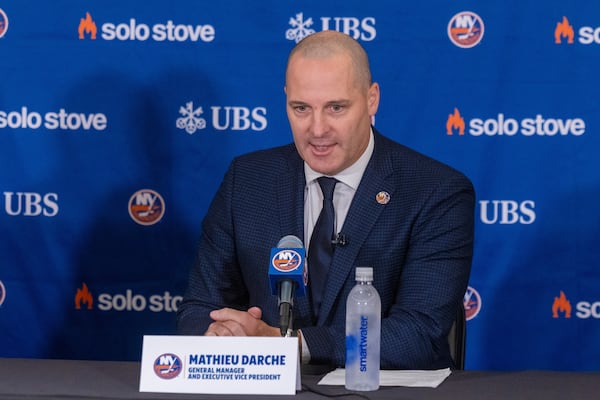 Mathieu Darche speaks as he is introduced as the new General Manager of the New York Islanders at UBS Arena in Elmont, N.Y., Thursday, May 29, 2025. (Howard Schnapp/Newsday via AP)