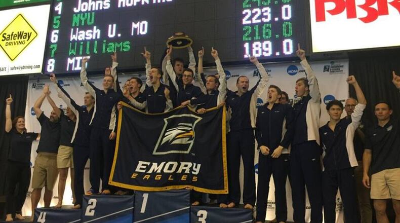 The Emory men’s swim team on the winner’s podium on Saturday night in Shenandoa, Texas. (Photo courtesy of Emory)