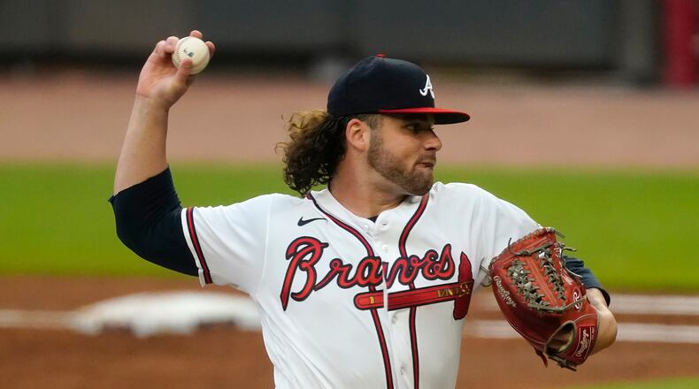 Braves pitcher Bryse Wilson works against the Chicago Cubs on Thursday, April 29, 2021, in Atlanta. (AP Photo/John Bazemore)