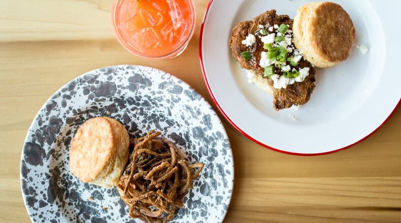 Holler and Dash Pork Rambler biscuit (left), Kickback Chicken biscuit (right) and strawberry pineapple Aqua Fresca drink. Photo credit- Mia Yakel.