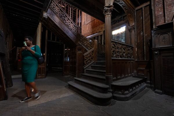 Felicia Moore (left) is the listing agent for the Rufus M. Rose House, which went up for sale in November. (Ben Gray for the AJC)