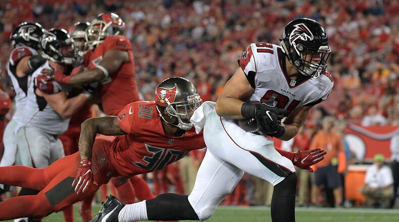 Atlanta Falcons tight end Austin Hooper (81) beats Tampa Bay Buccaneers free safety Bradley McDougald (30) on a 2-yard touchdown reception during the fourth quarter of an NFL football game Thursday, Nov. 3, 2016, in Tampa, Fla. (AP Photo/Phelan Ebenhack)