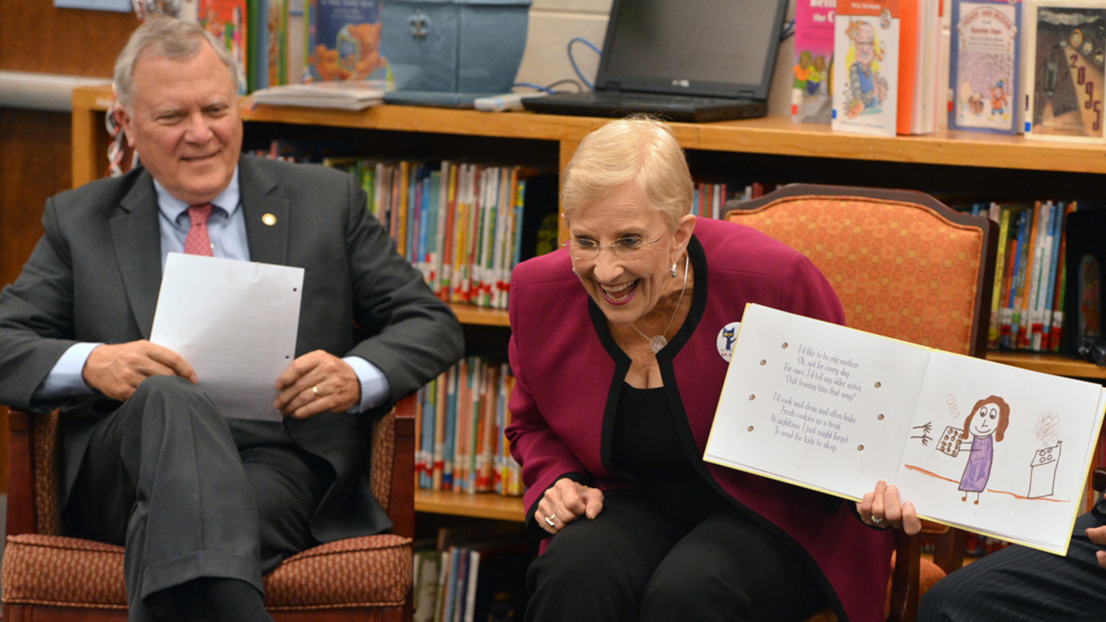 While it's important for the government to support early education programs — as Georgia Gov. Nathan Deal (left) and his wife, Sandra, are pictured doing as they read to children in 2012 — building a child's reading and comprehension skills begins at home. Among the tips for improving young children's reading skills is to replace screen time with parental interactionsm including discussing stories as you read to kids, narrating life around your child and asking children to talk about what interests them. (Johnny Crawford/AJC 2012)