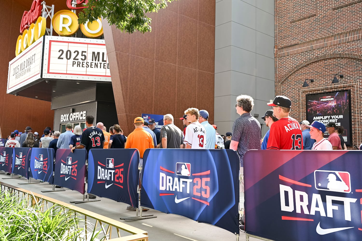 Attendees stand in line during the 2025 MLB Draft Sunday, July 13, 2025 at the Coca-Cola Roxy in Atlanta. (Daniel Varnado/For the Atlanta Journal-Constitution)
