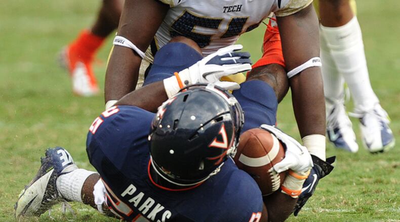 September 15, 2012 -Atlanta: Georgia Tech's Quayshawn Nealy (54) stands over Virginia's Kevin Parks (25) after delivering a hard hit during their game at Bobby Dodd Stadium on Saturday, September 15, 2012. Georgia Tech won the game 56 to 20. JOHNNY CRAWFORD /JCRAWFORD@AJC.COM Georgia Tech linebacker Quayshawn Nealy sounded a positive note Sunday at the ACC Kickoff in Greensboro, N.C.