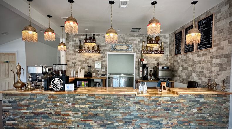 Ahmad and Marianna Azhoukani opened Mint Coffeehouse last week in Tucker. The coffee shop combines Syrian and American culture.