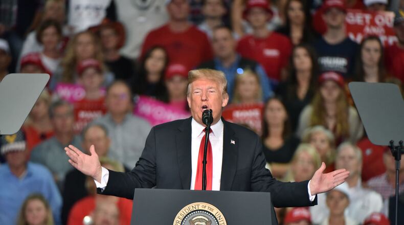 President Donald Trump on Sunday urged Georgians to support Brian Kemp for governor.
