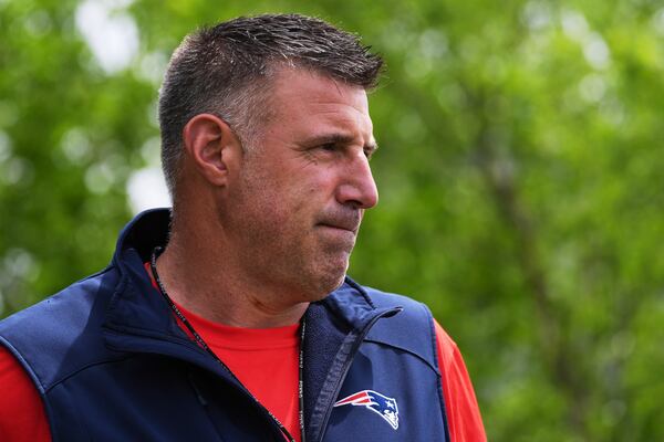 New England Patriots head coach Mike Vrabel walks towards the field during an NFL football practice, Wednesday, May 28, 2025, in Foxborough, Mass. (AP Photo/Charles Krupa)