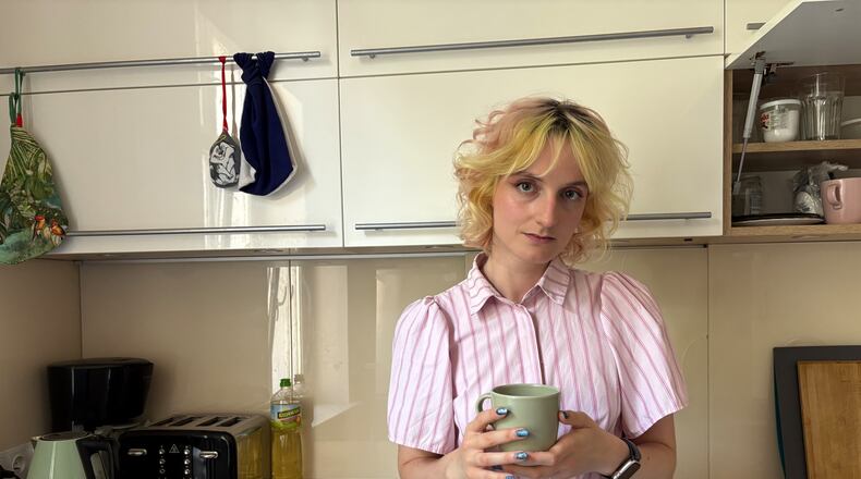Nastya Podorozhnya stands in the kitchen of the shelter which the Martynka non-profit is running in Krakow, Poland, Thursday, July 2, 2026. (AP Photo/Claudia Ciobanu)