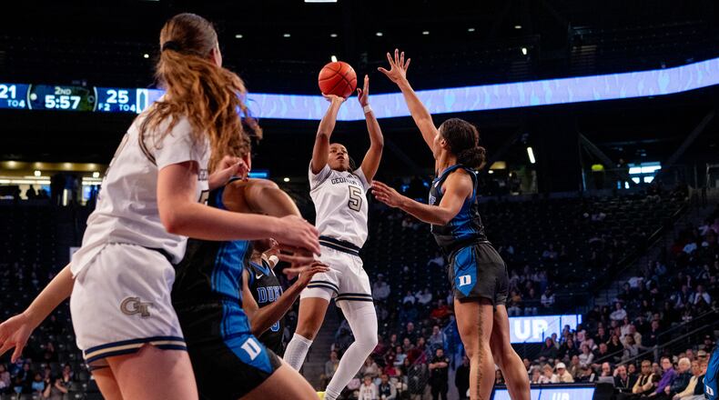 No. 18 Georgia Tech's Tonie Morgan (5) attempts at shot Sunday against No. 14 Duke at McCamish Pavilion.