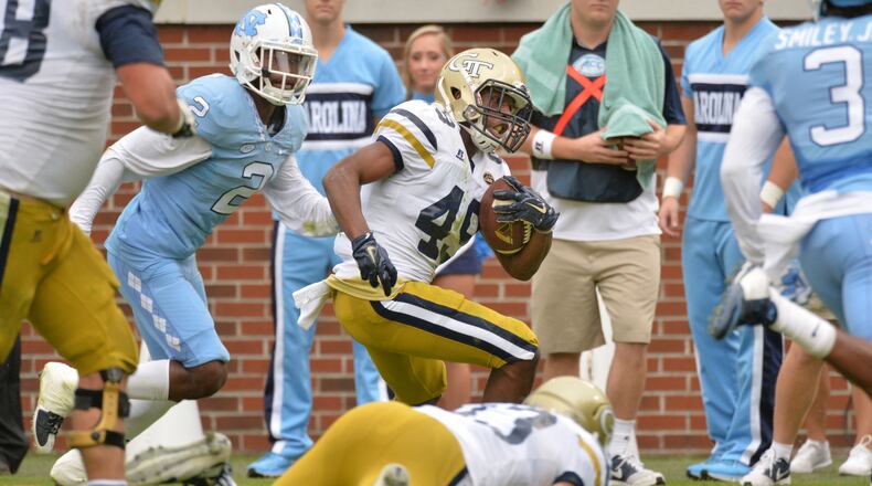 October 3, 2015 Atlanta - Georgia Tech Yellow Jackets running back Clinton Lynch (49) rushes for a touchdown against the North Carolina Tar Heels in the first half at Bobby Dodd Stadium on Saturday, October 3, 2015. HYOSUB SHIN / HSHIN@AJC.COM