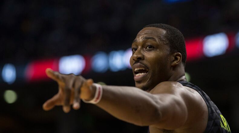 Atlanta Hawks’ Dwight Howard directs a teammate during first-half NBA basketball game action against the Toronto Raptors in Toronto, Friday, Dec. 16, 2016. (Chris Young/The Canadian Press via AP)