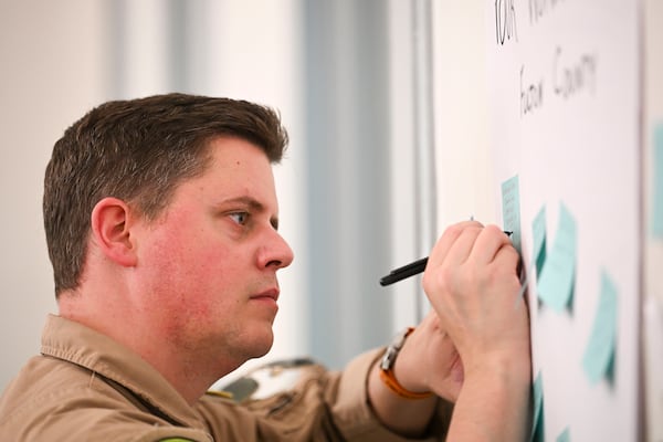 Than Hunter, a Howell Station resident, says that data centers may be necessary for today's conveniences but that regulatory agencies and corporations shouldn't "run roughshod over people." (Daniel Varnado/For the Atlanta Journal-Constitution)