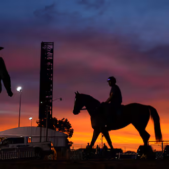 A horse is ridden to the track for a workout at Churchill Downs on Monday, April 27, 2026, in Louisville, Kentucky. Churchill Downs is getting ready to host the Kentucky Derby on Saturday, May 2, 2026. (Charlie Riedel/AP)