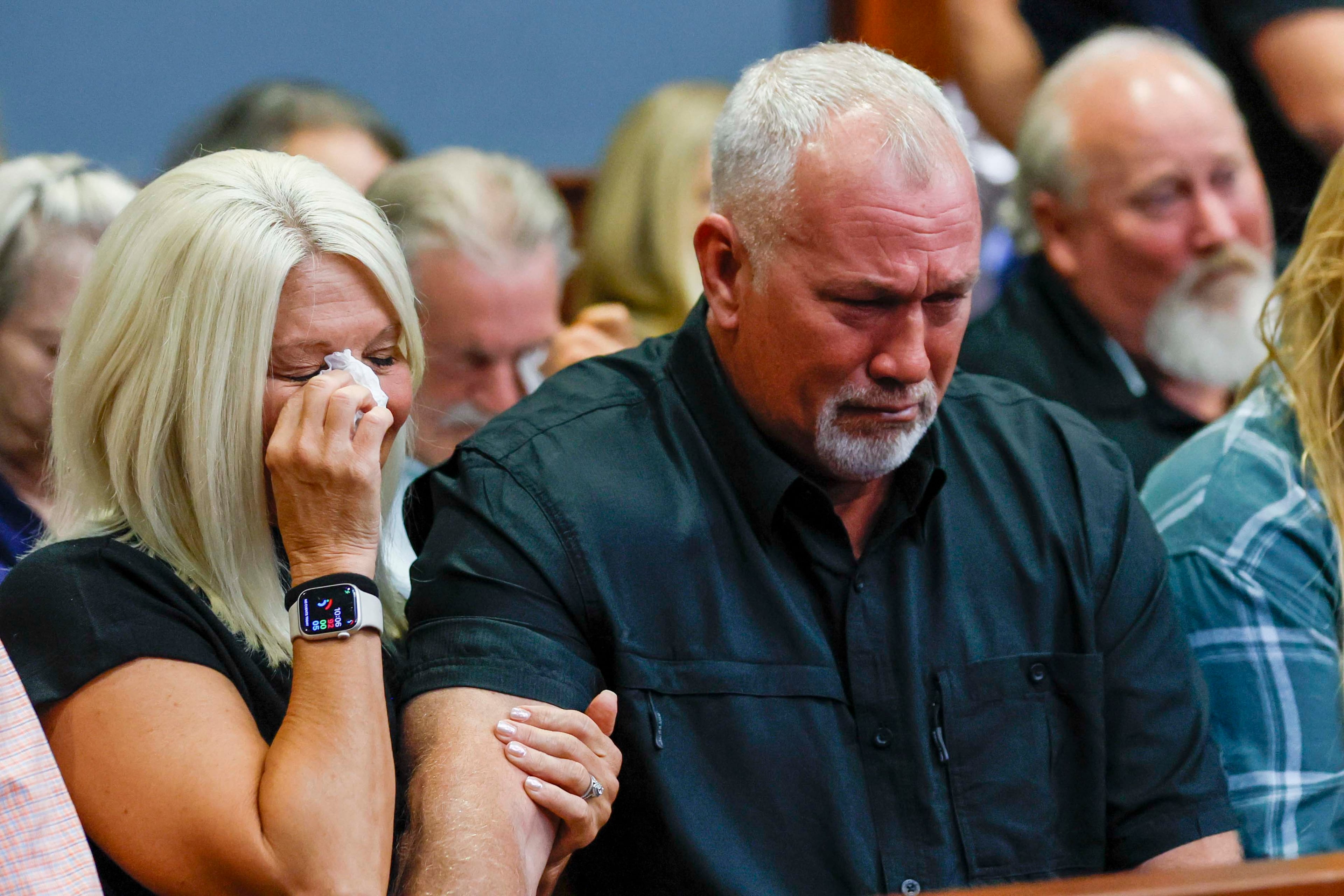 Kellie Lindsey and her husband Allen Lindsey react after taking the stand at the Carroll County courthouse during the sentencing hearing of Anthony Scott, who killed their daughter, Kylie Lindsey, in 2015, on Wednesday, October 1, 2025. Anthony “AJ” Scott must serve 10 years behind bars, with the remaining half of the sentence on probation, related to the vehicular homicide in September 2015, Judge Erica Tisinger ruled.
(Miguel Martinez/ AJC)