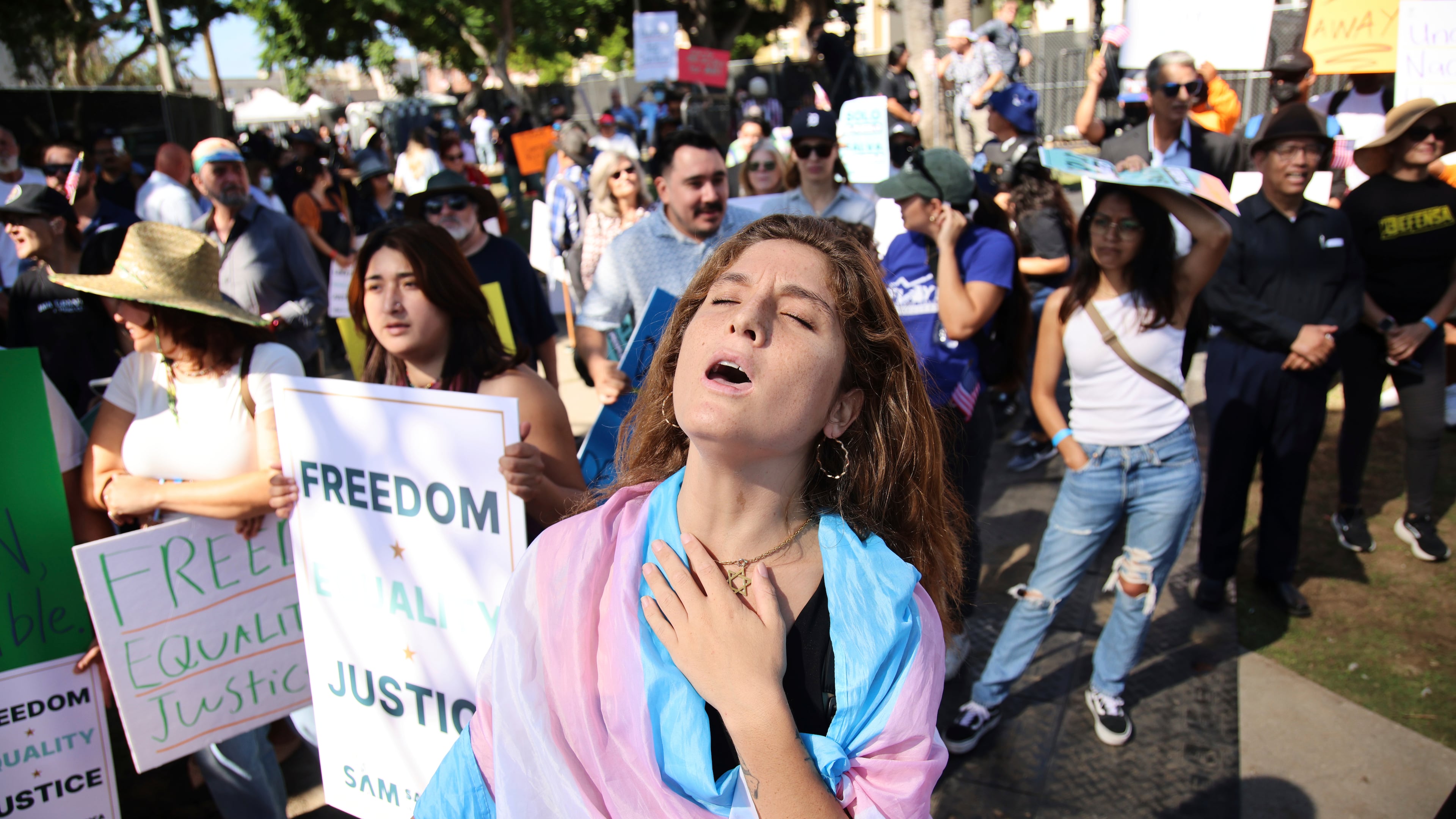 Supporters gather during an immigration rally on Saturday, Sept. 20, 2025, in Los Angeles. (AP Photo/Ethan Swope)