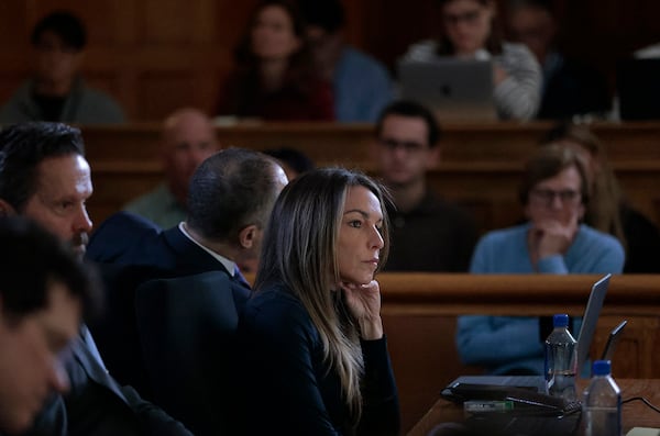 Karen Read listens to the testimony of digital forensics analyst Shanon Burgess during her retrial in the Norfolk Superior Court, Monday, May 19, 2025, in Dedham, Mass. (Pat Greenhouse/The Boston Globe via AP, Pool)