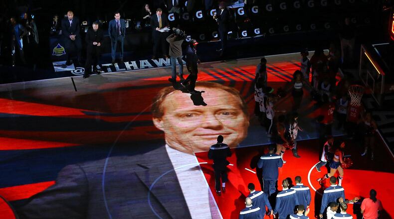 011115 ATLANTA: The image of Hawks head coach Mike Budenholzer is projected on the hardwood as the Hawks players and coaches take the floor to play the Wizards on their way to an eight straight victory during a basketball game on Sunday, Jan. 11, 2015, in Atlanta. The Hawks beat the Wizards 120-89. Curtis Compton / ccompton@ajc.com What does Mike Budenholzer, the Hawks' big picture guy, have planned? (Curtis Compton, AJC)