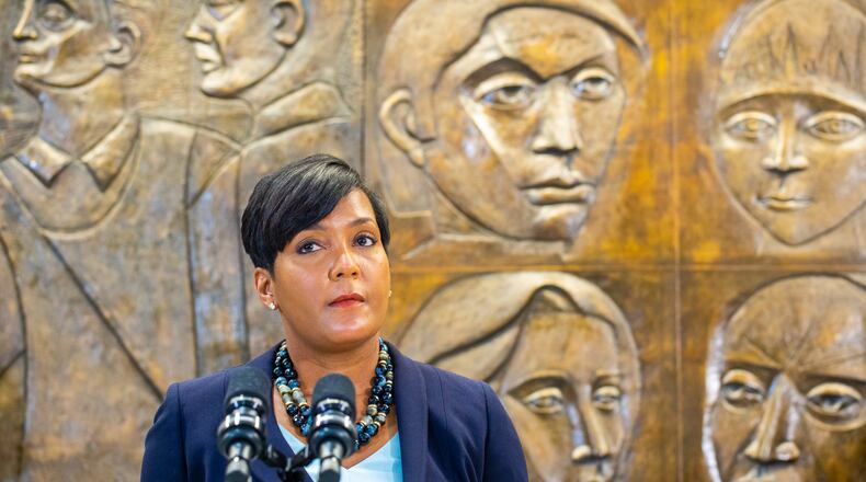Atlanta Mayor Keisha Lance Bottoms leads a press conference Tuesday, Aug 3, 2021 at City Hall to address a rise in crime, the recent murder in Piedmont Park and covid delta concerns. She is supported by Deputy Chief Charles Hampton, Atlanta Police Chief Rodney Bryant and Emory infectious diseases Dr. Carlos Del Rio to address while addressing city's current issues. (Jenni Girtman for The Atlanta Journal-Constitution)