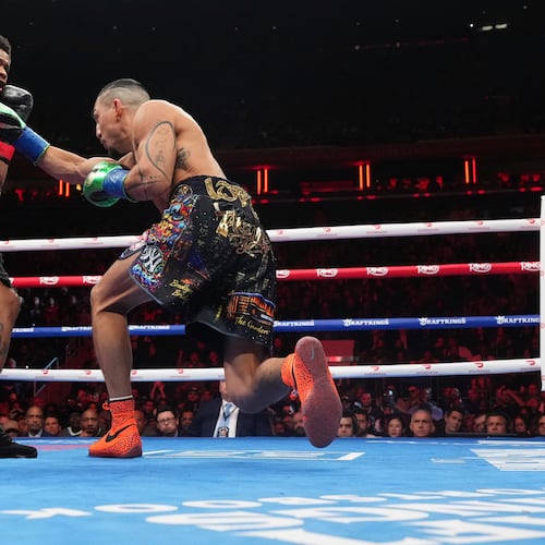 Shadur Stevenson, left, fights Teofimo Lopez during a super lightweight title boxing match Sunday, Feb. 1, 2026, in New York. (AP Photo/Frank Franklin II)