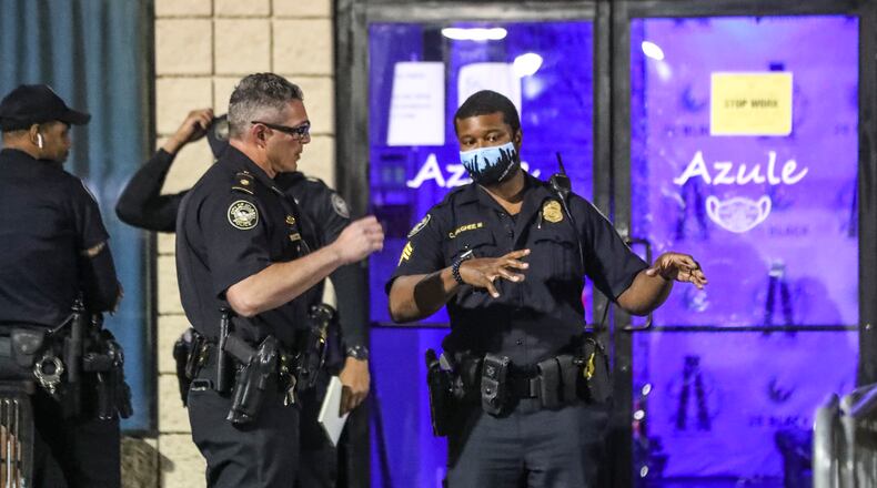 Atlanta police investigate the scene of a shooting on May 17, 2021, at the Azule Restaurant and Lounge, located at 2625 Piedmont Road NE in the Lindbergh area of Buckhead. (John Spink / John.Spink@ajc.com)