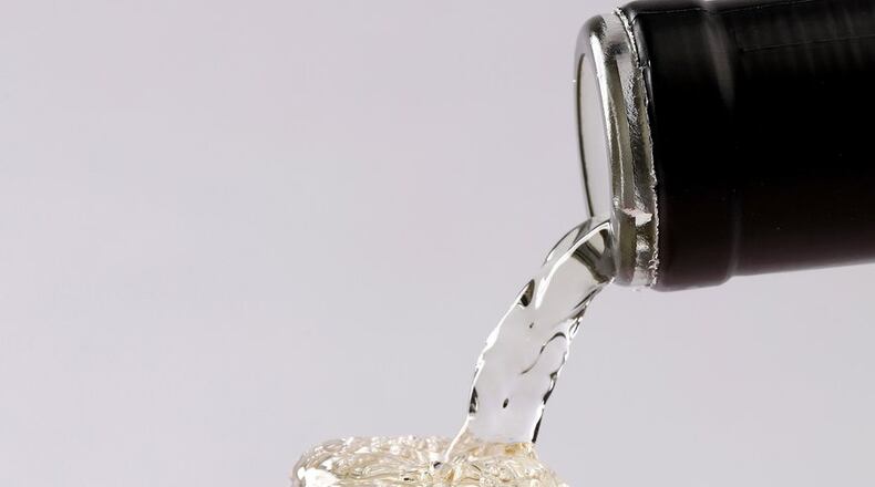 One of the best ways to store leftover wine, and certainly the simplest, is to pour it into a smaller container that holds the liquid without leaving an air pocket. (Michael Tercha/Chicago Tribune/TNS)