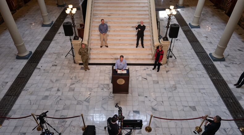 200408-Atlanta-Gov. Brian Kemp gives remarks and answers questions during a press conference Wednesday afternoon April 8, 2020 at the Georgia State Capitol. Ben@BenGray.com for the Atlanta Journal-Constitution