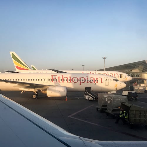 FILE - Ethiopian Airlines planes are parked at Bole International Airport in Addis Ababa, Ethiopia, Monday, Feb. 11, 2019. (AP Photo/Ben Curtis, File)