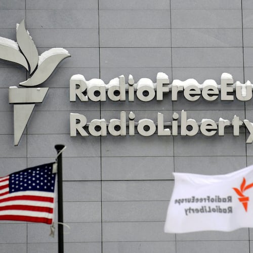 FILE - The headquarters of Radio Free Europe/Radio Liberty (RFE/RL) is seen with the American flag in the foreground, in Prague, Jan. 15, 2010. (Michal Kamaryt/CTK via AP, file)