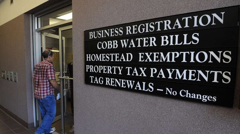 Stephen White, the director and chief appraiser for the Cobb County Tax Assessor s office, qualified for an exemption from county school taxes after his father moved in with him and White added him to his property deed. JOHNNY CRAWFORD / FOR THE AJC