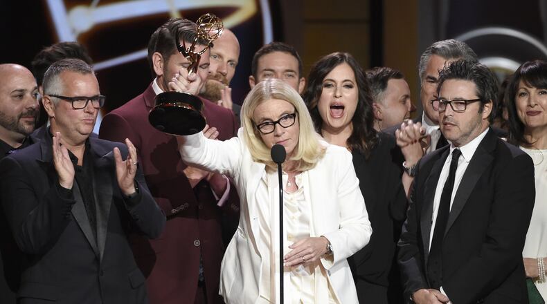 Mary Connelly, center, accepts the award for outstanding entertainment talk show for “The Ellen DeGeneres Show” at the 44th annual Daytime Emmy Awards Sunday. Contributed by Chris Pizzello/Invision/AP