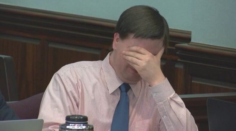 During testimony last week, Justin Ross Harris reacts to hearing his brother testify about a trip their families took together. (Screen capture via WSB-TV)