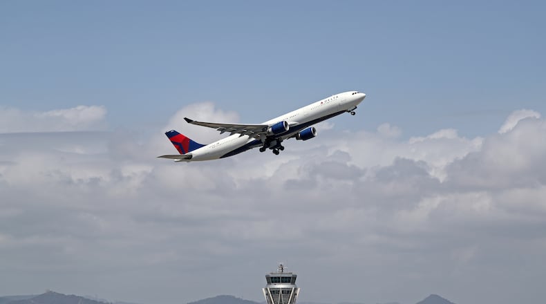 Delta Air Lines flight takes off from Barcelona-El Prat Airport in Spain. Delta's first trans-Atlantic flight left Atlanta for London in 1978. It began trans-Pacific service in 1987. (Photo by Urbanandsport/NurPhoto via Getty Images)