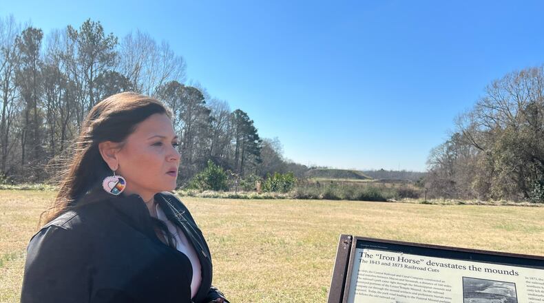 Tracie Revis, the director of advocacy for the Ocmulgee National Park and Preserve Initiative, overlooking the at the Ocmulgee Mounds National Historic Park.
