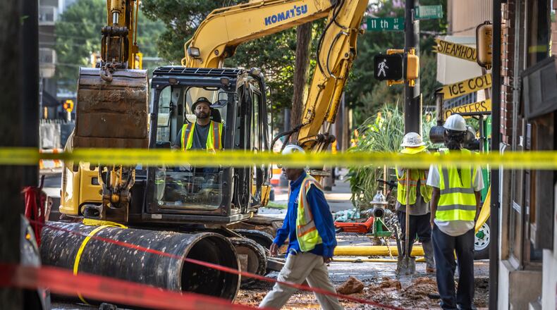 Work on the broken main at West Peachtree and 11th streets in Midtown.