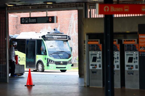 An ATL Spoke bus is arriving at the West End MARTA Station on Monday, June 1, 2026. The ATL Spoke autonomous pilot program’s first route connects the Beltline Southwest Trail with MARTA Rail. There are stops at MARTA West End Station, Joseph E. Lowery Blvd at Beecher Street, and two stops within the Lee + White district.  (Miguel Martinez/AJC)