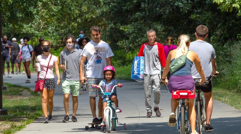 People walk along the Beltline in August. STEVE SCHAEFER FOR THE ATLANTA JOURNAL-CONSTITUTION