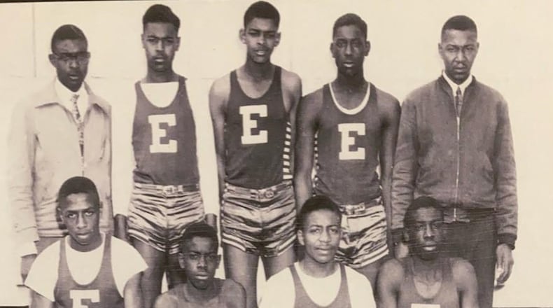 Eatonton Colored High School's basketball team from the 1949-50 GIA season. Pictured are (front row, from left) Herbert Stokes, J.W. Freeman, Frederick Griffith, Charles Freeman and (back row, from left) coach Odell Owens, Willie Frank Daniel, James Few, Roy Little and Principal W.N. McGlockton. Charles Freeman, now 91, is among the former GIA athletes interviewed in the GPB documentary "As If We Were Ghosts," which will air Monday and Thursday.