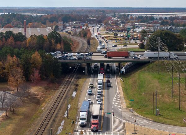 Ga. 155 at Interstate 75 has grown into one of Henry County's traffic congestion hotspots. (Hyosub Shin/AJC)