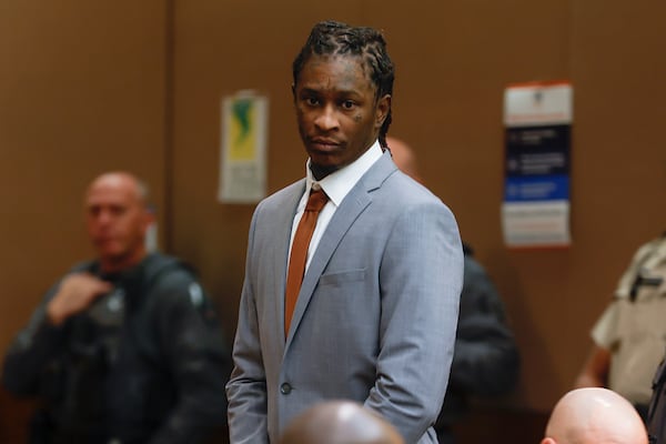 FILE - Atlanta rapper Young Thug, whose real name is Jeffrey Williams, enters the courtroom at Fulton County Courthouse in Atlanta, Dec. 19, 2022. (Natrice Miller/Atlanta Journal-Constitution via AP)