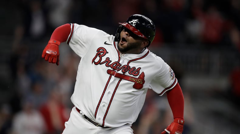 Atlanta Braves' Pablo Sandoval celebrates after hitting a two-run home run in the ninth inning of a baseball game against the Philadelphia Phillies, Saturday, May 8, 2021, in Atlanta. (AP Photo/Ben Margot)