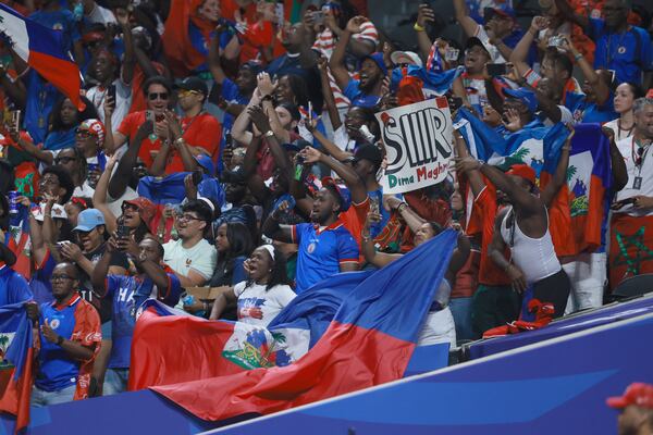 Haiti fans cheer during a World Cup match in Atlanta on Wednesday.  (Jason Getz/AJC)