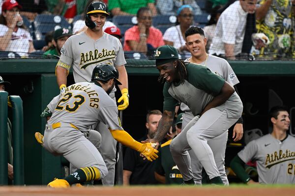 Athletics catcher Shea Langeliers (left) had quite the Tuesday night.