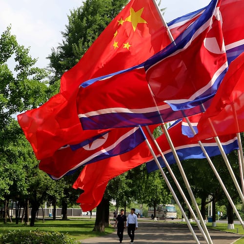A street is decorated with the flags of China and North Korea in Pyongyang, on Monday, June 8, 2026. (AP Photo/Jon Chol Jin)